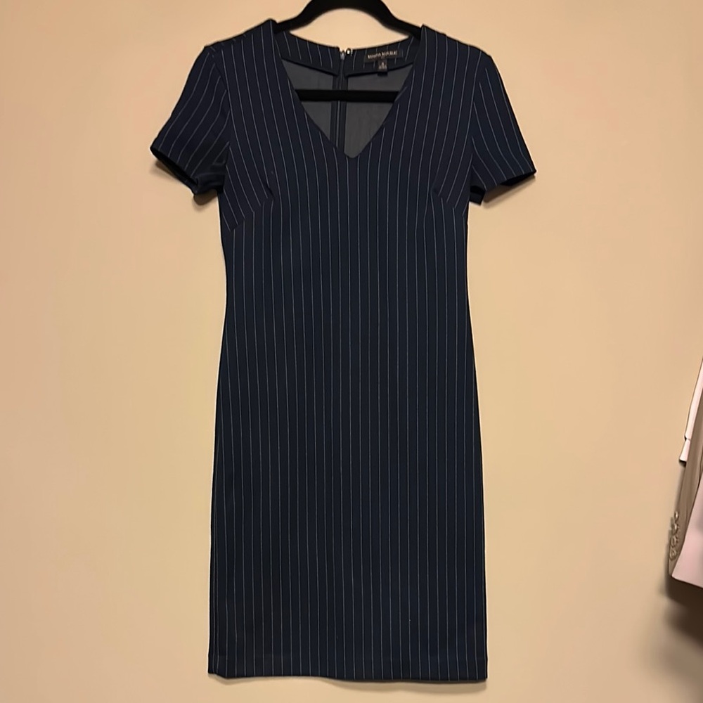 Blue knee-length sheath dress with short sleeves and v-neck for work